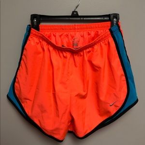 ORANGE NIKE RUNNING SHORTS